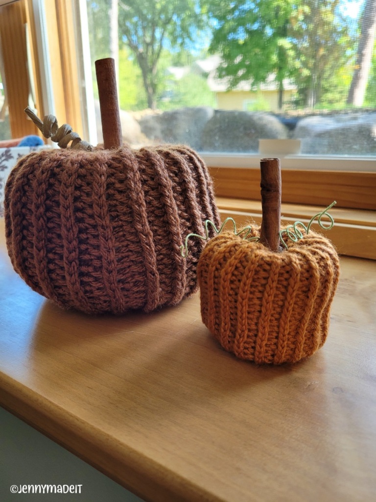 This is a photo of two crocheted pumpkins I made.